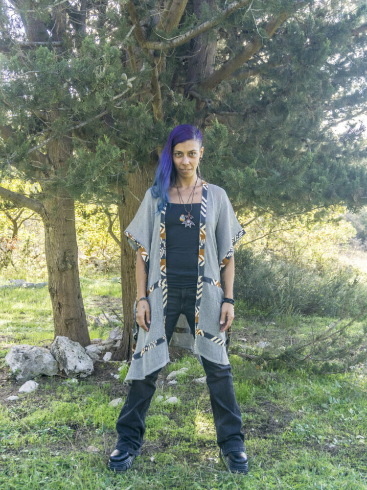 Cotton kimono with open weave design. Lightweight and breathable kimono for styling.